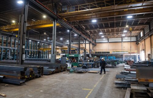 A worker walks through the warehouse at Central Steel Supply Company in Marlborough