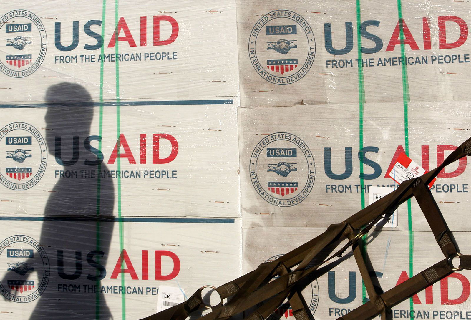 <i>Cheryl Ravelo/Reuters/File via CNN Newsource</i><br/>The shadow of a Philippine Army personnel is cast on boxes of relief items from U.S. Agency for International Development (USAID) for the victims of super typhoon Haiyan