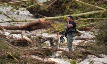 First responders carry out search and rescue operations near the Guadalupe River on July 7 after a flash flood swept through the area in Ingram