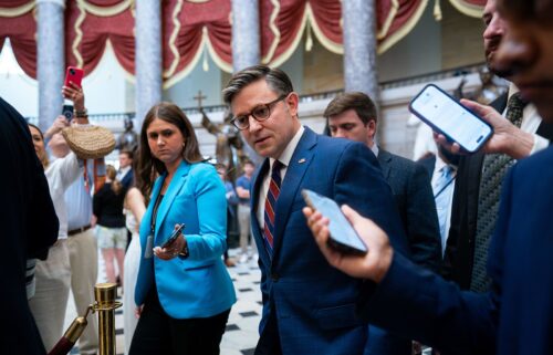 US House Speaker Mike Johnson speaks to members of the media while walking to the House Chamber during a vote at the US Capitol in Washington
