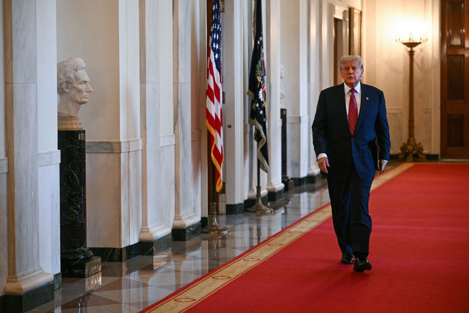 <i>Brendan Smialowski/AFP/Getty Images via CNN Newsource</i><br/>US President Donald Trump arrives to sign the GENIUS Act at the White House in Washington