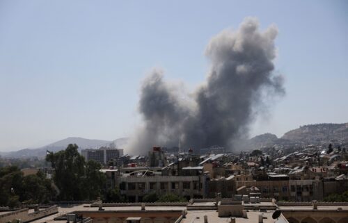 Smoke rises after strikes on Syria's defense ministry in Damascus
