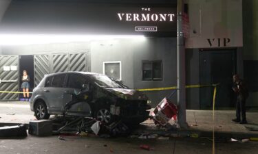 Police patrol vehicles close Vermont Ave. after a vehicle rammed into a crowd gathered outside "The Vermont" nightclub in Los Angeles