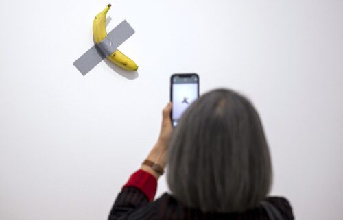 "Comedian" by Italian artist Maurizio Cattelan is pictured. Italian artist Maurizio Cattelan’s artwork featuring a fresh banana taped to a wall has been eaten by a visitor to a museum in France.