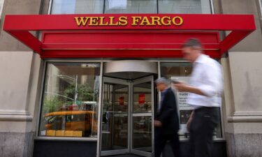 People walk by a Wells Fargo bank branch in New York City
