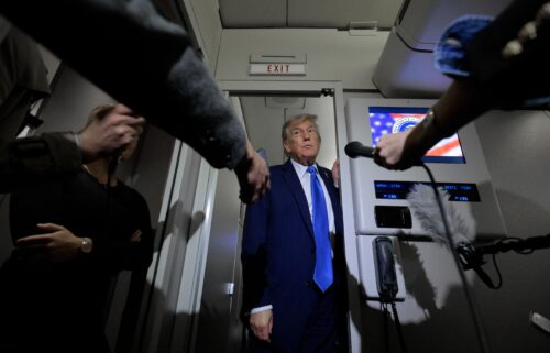 President Donald Trump talks to reporters in the press pool aboard Air Force One during a trip in June. The White House said on July 21 that it will remove the Journal from one of the coveted press seats on President Trump’s upcoming trip to Scotland.