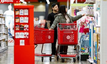 Shoppers look for bargains at a Target in Chicago. The retail is ending its "price match" policy later this month.