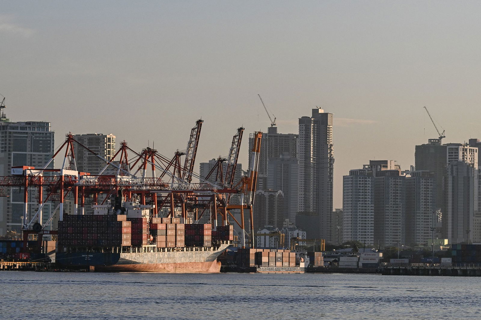 <i>Jam Sta Rosa/AFP/Getty Images via CNN Newsource</i><br/>Shipping containers are seen docked at a port in Manila on April 8.