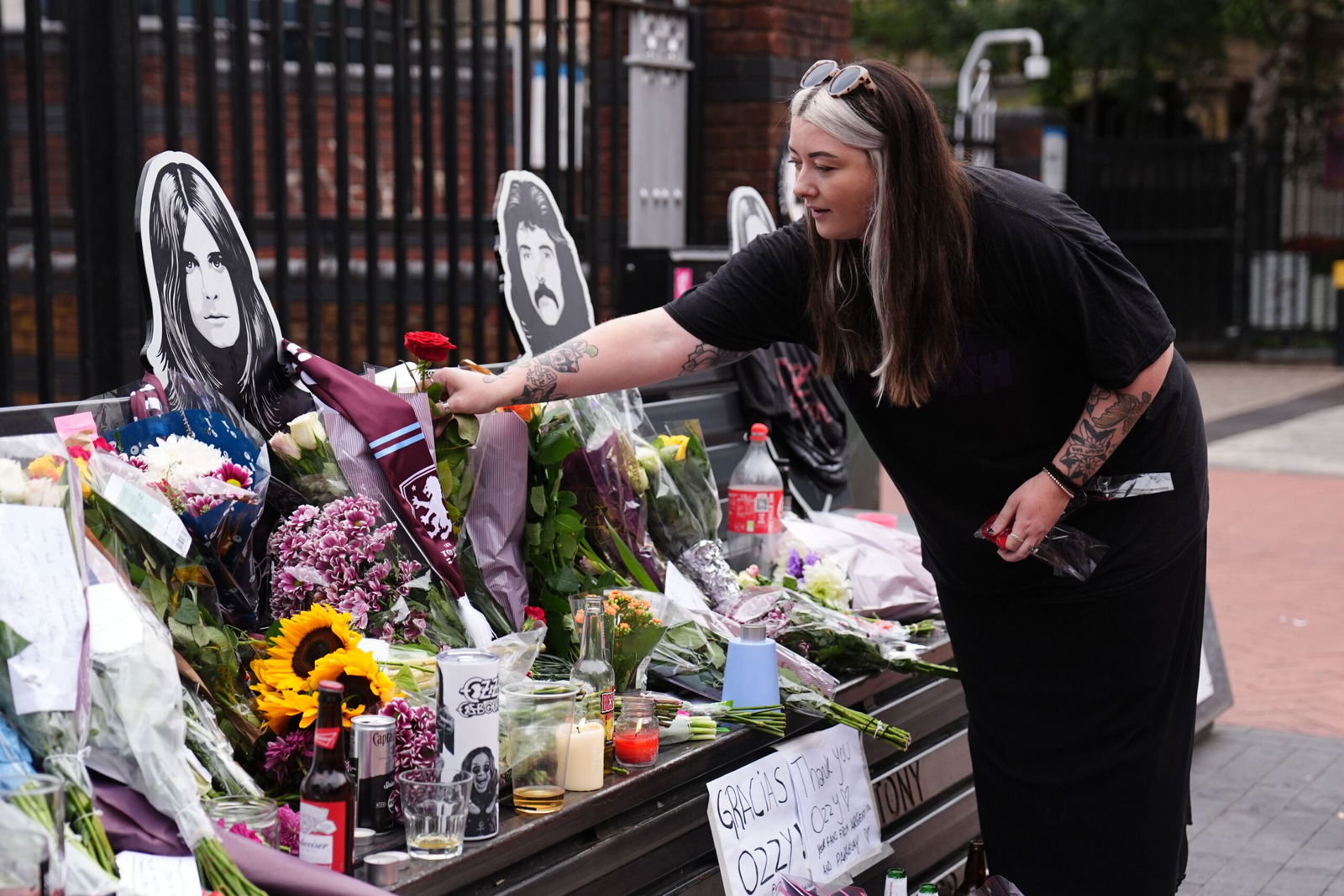 <i>Jacob King/PA Images/Getty Images via CNN Newsource</i><br/>Fans left floral tributes beside the Sabbath Wall in Birmingham