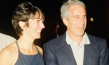 People walk by the Upper East Side New York estate of mulitmillionaire Jeffrey Epstein pm July 9