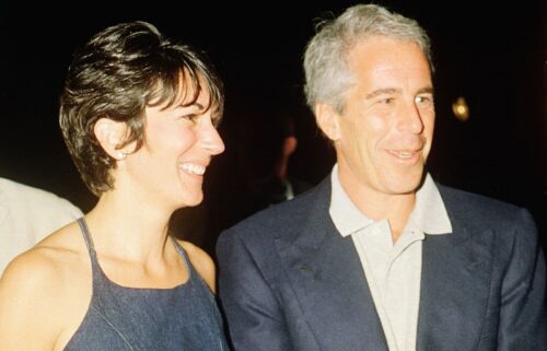 People walk by the Upper East Side New York estate of mulitmillionaire Jeffrey Epstein pm July 9