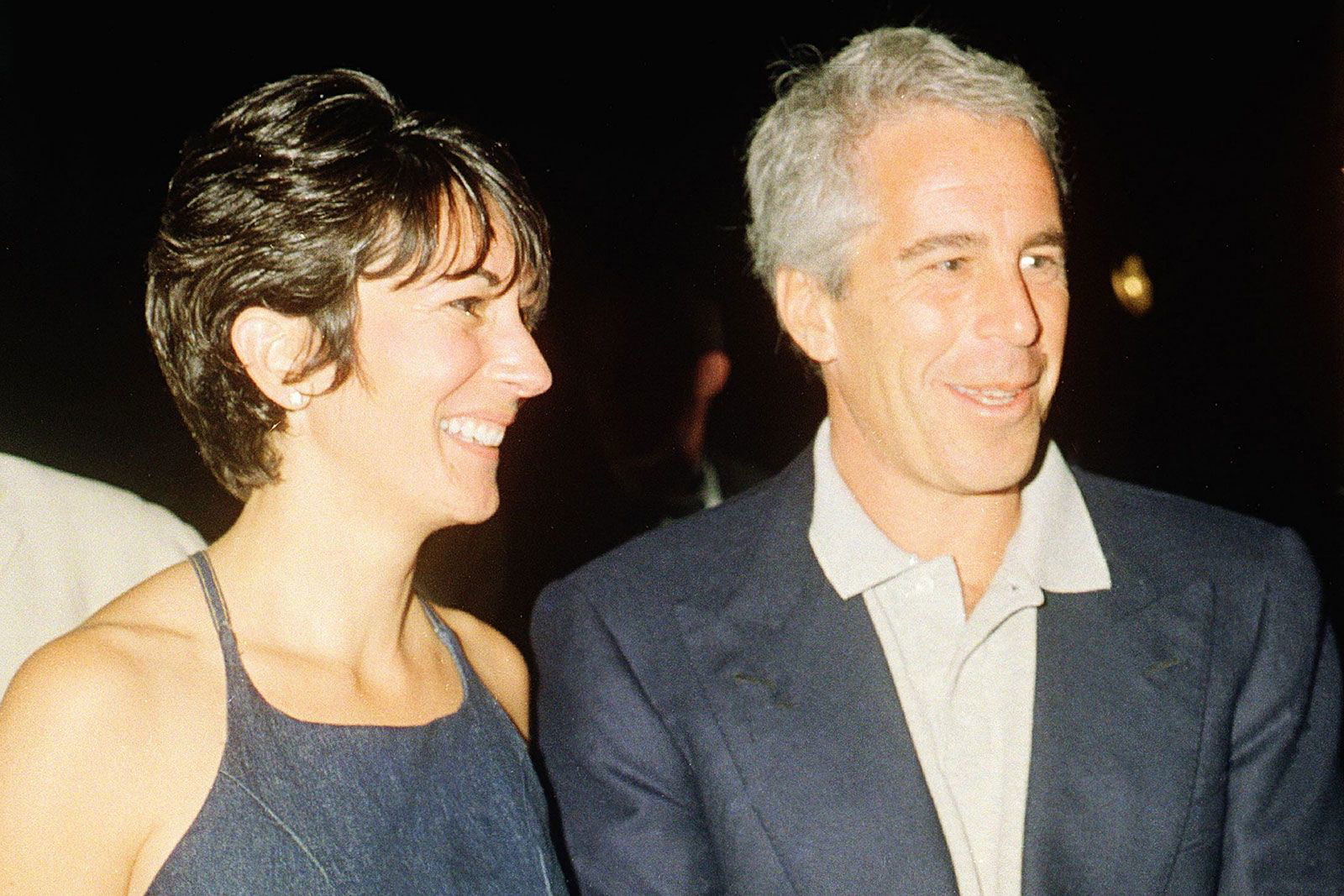 <i>Emily Michot/Miami Herald/Tribune News Service/Getty Images/File via CNN Newsource</i><br/>People walk by the Upper East Side New York estate of mulitmillionaire Jeffrey Epstein pm July 9