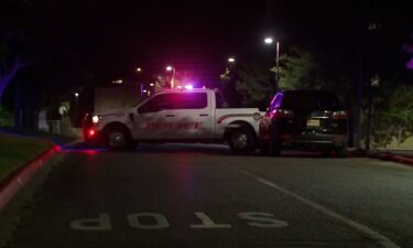 Police are seen at the scene of a shooting at The University of New Mexico on July 25 in Albuquerque.