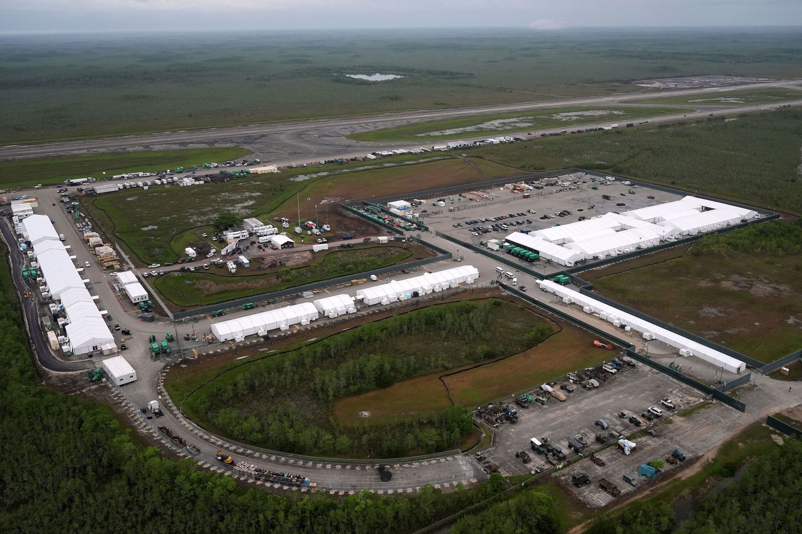 <i>Rebecca Blackwell/AP via CNN Newsource</i><br/>Work progresses July 4 on the migrant detention facility dubbed
