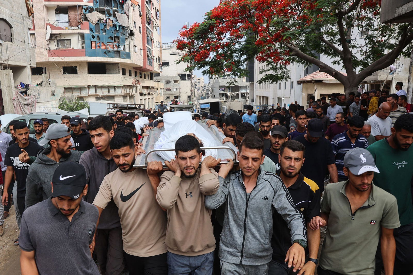 <i>Reuters via CNN Newsource</i><br/>Palestinians gather to receive aid supplies in Beit Lahia