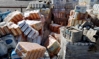 This photo reviewed by the Israel Defense Forces shows parcels of humanitarian aid await transfer into Gaza at the Gaza side of the Kerem Shalom crossing in the Gaza Strip on July 24.