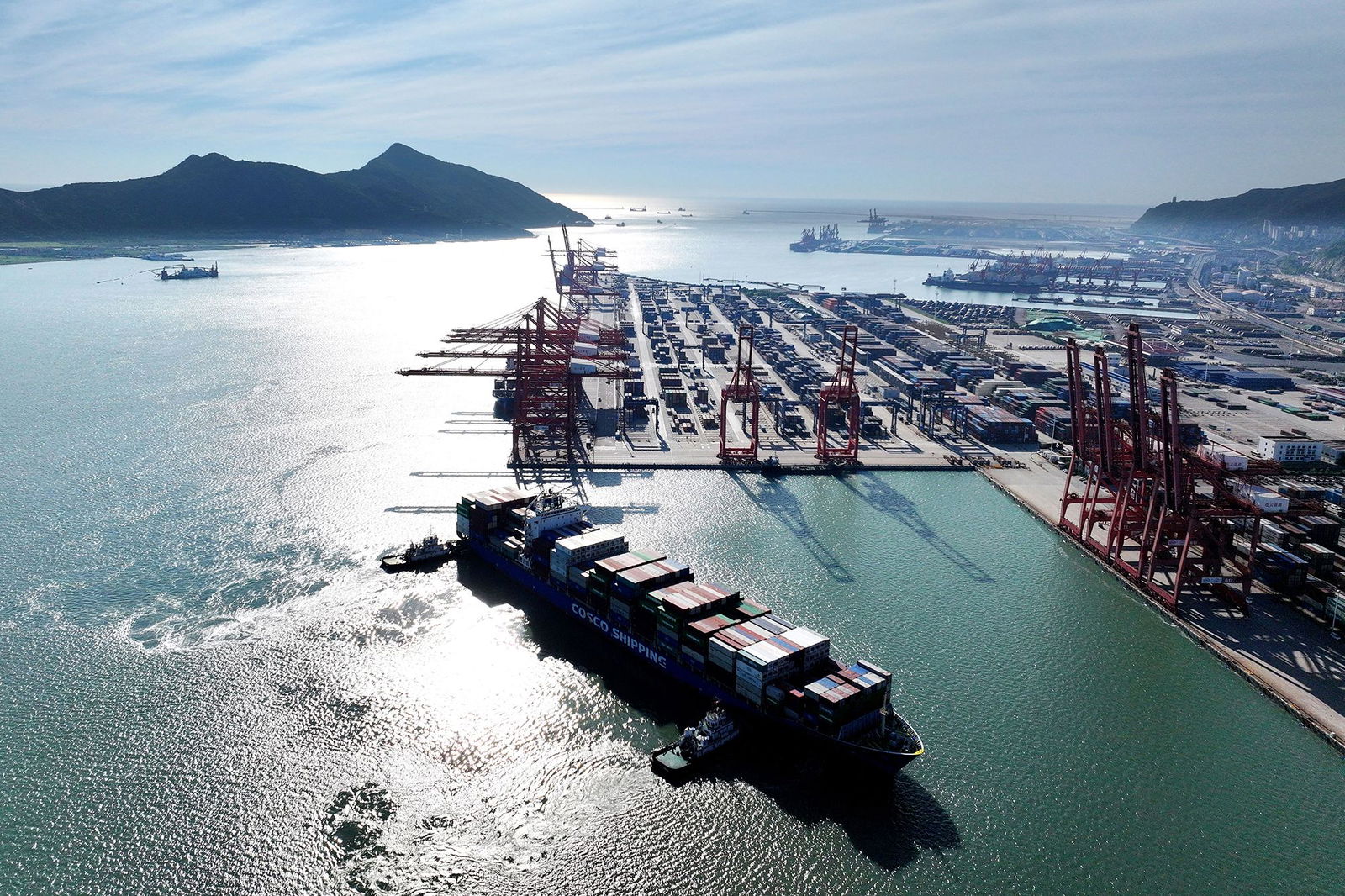 <i>AFP/Getty Images via CNN Newsource</i><br/>A container ship arrives at the port in Lianyungang