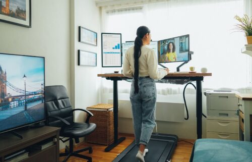 Using a desk treadmill is one easy way to fit exercise into a busy schedule.