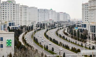 Cars move through the Turkmen capital of Ashgabat on March 10