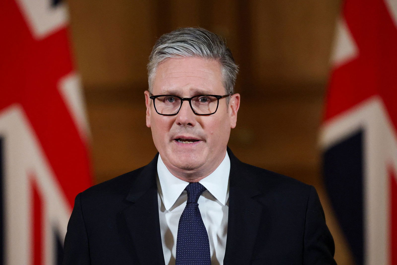 <i>Toby Melville/Pool/Reuters via CNN Newsource</i><br/>Britain's Prime Minister Keir Starmer delivers a statement inside No. 10 Downing Street in London