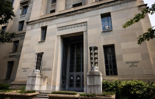 The Justice Department has fired two senior antitrust attorneys who disagreed with the handling of a merger between two powerhouse companies
