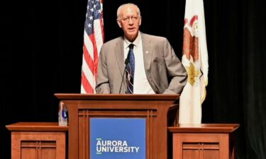 Rep. Bill Foster speaks during a town hall in Aurora
