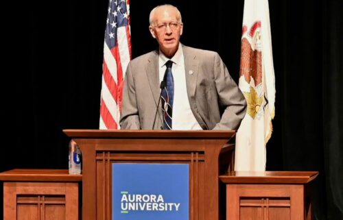Rep. Bill Foster speaks during a town hall in Aurora