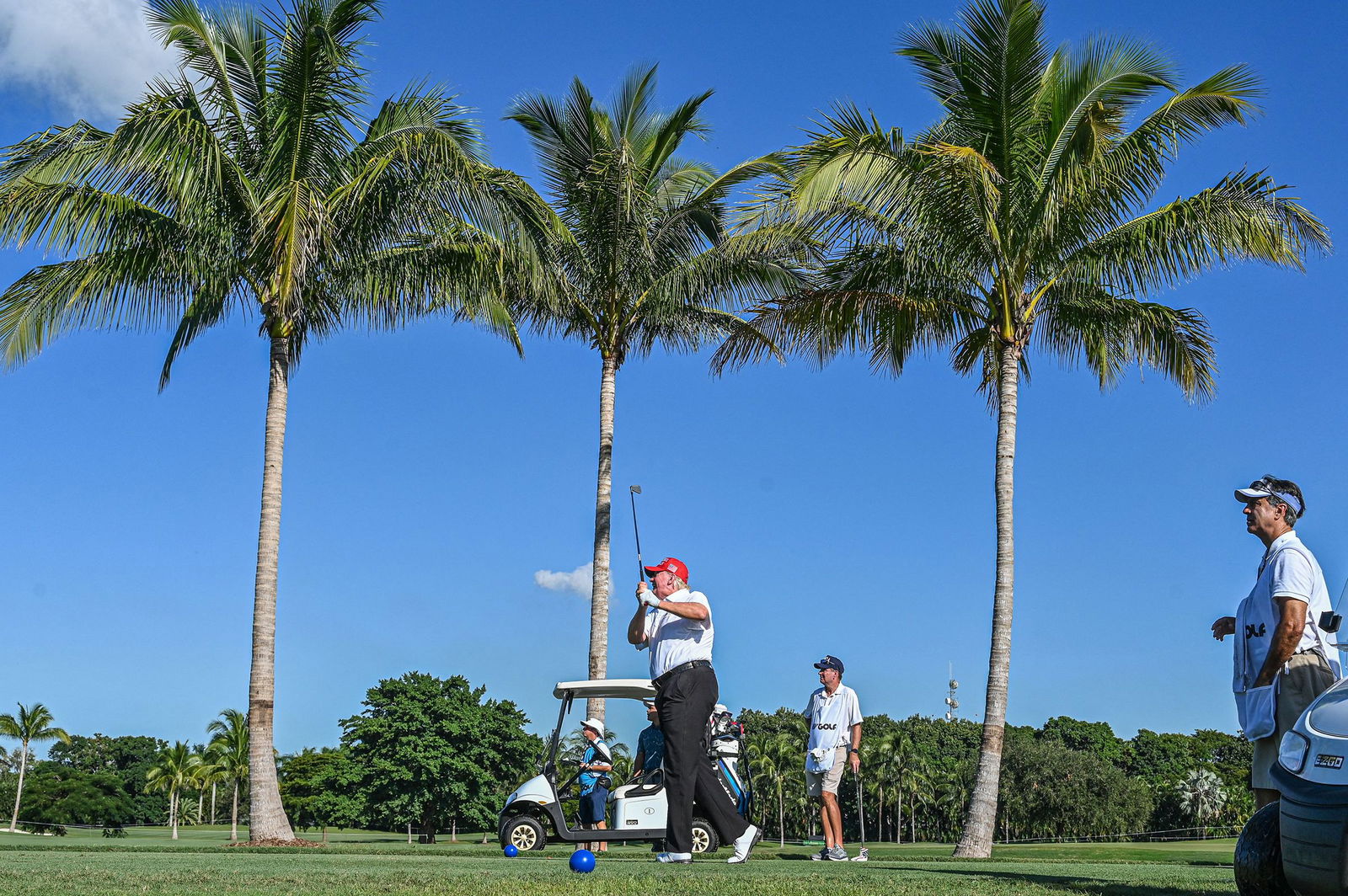 <i>Giorgio Viera/AFP/Getty Images via CNN Newsource</i><br/>This October 2022 photo shows Donald Trump playing golf at Trump National Doral Miami golf club on in Miami.