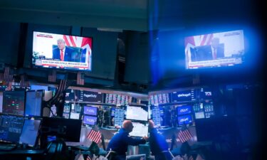 A television broadcast shows President Donald Trump on the floor of the New York Stock Exchange on July 28.