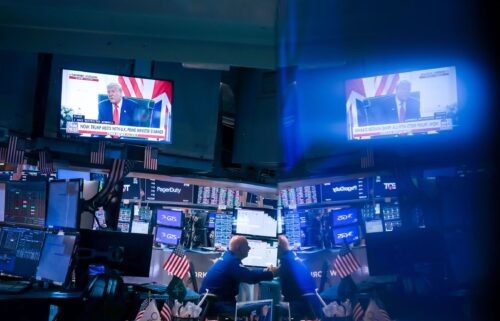 A television broadcast shows President Donald Trump on the floor of the New York Stock Exchange on July 28.