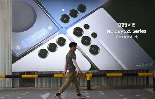 Samsung Electronics employees check the smartphone Galaxy S25 series at a Samsung store in Seoul