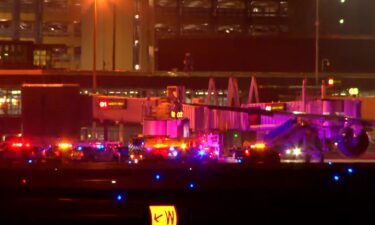 Emergency crews on the scene at Minneapolis-Saint Paul International Airport after a Delta Air Line flight made an emergency landing.