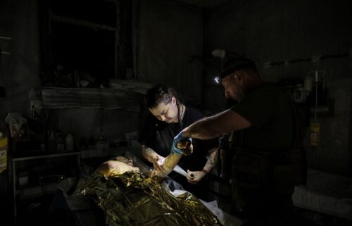 Combat medics of the Ukrainian Armed Forces treat an injured Ukrainian serviceman near Chasiv Yar on July 25.