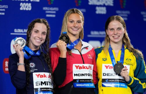 McIntosh tops the podium alongside Smith and Dekkers.