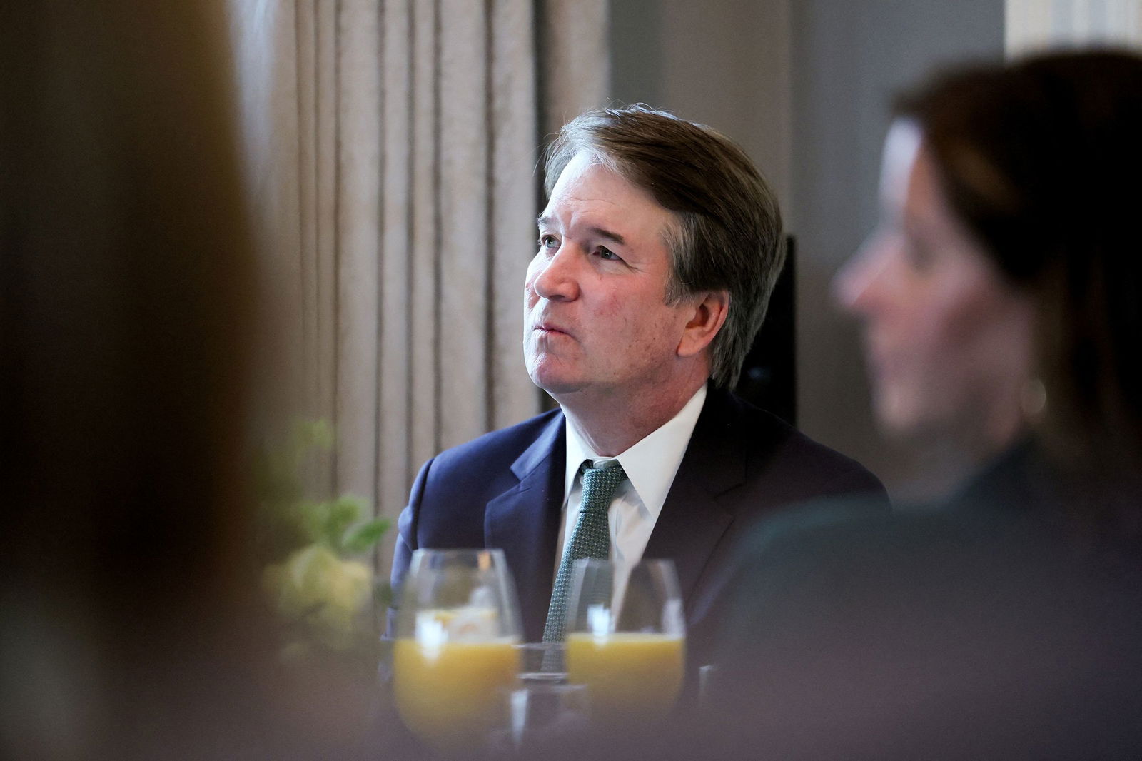 <i>Leah Millis/Reuters/File via CNN Newsource</i><br/>Supreme Court Justice Brett Kavanaugh listens to remarks at Vice President JD Vance's residence during a visit by Irish Taoiseach (Prime Minister) Micheal Martin