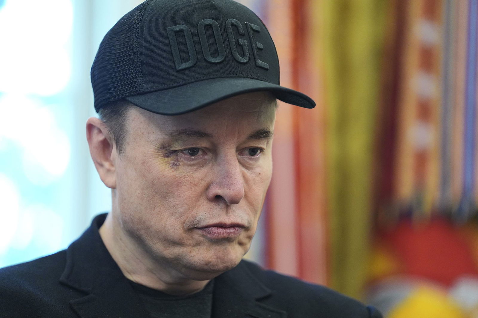 <i>Evan Vucci/AP via CNN Newsource</i><br/>Elon Musk attends a news conference with President Donald Trump in the Oval Office of the White House