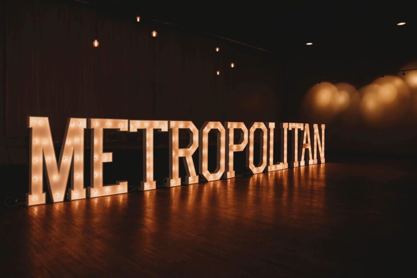 The Metropolitan spelled out in big light up letters for an event.