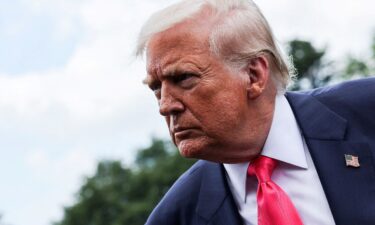 President Donald Trump speaks with reporters in Washington