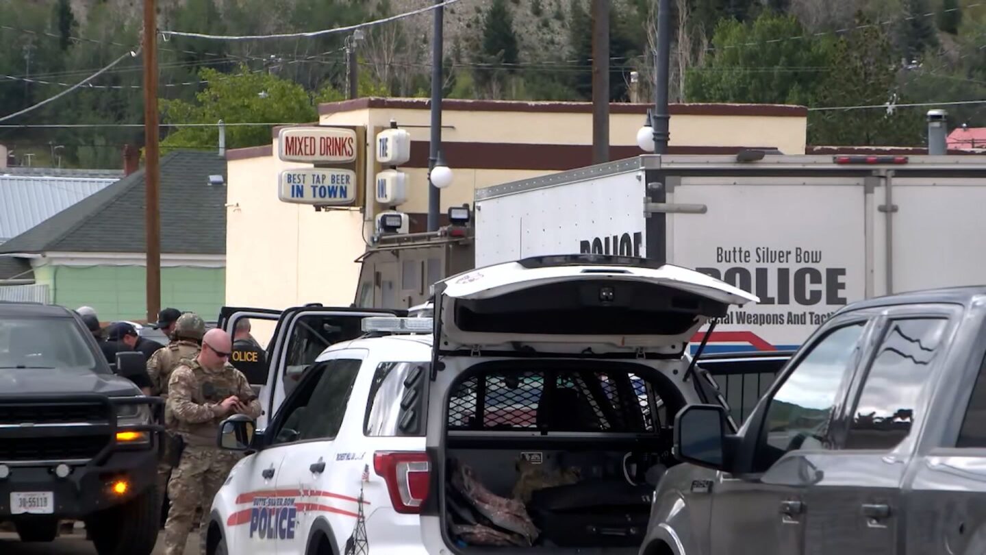 <i>KWYB/KTMF via CNN Newsource</i><br/>Police work the scene of a shooting in Anaconda