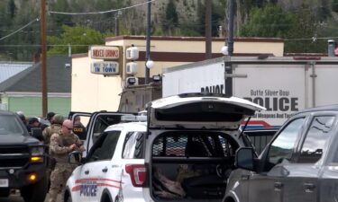 Police work the scene of a shooting in Anaconda