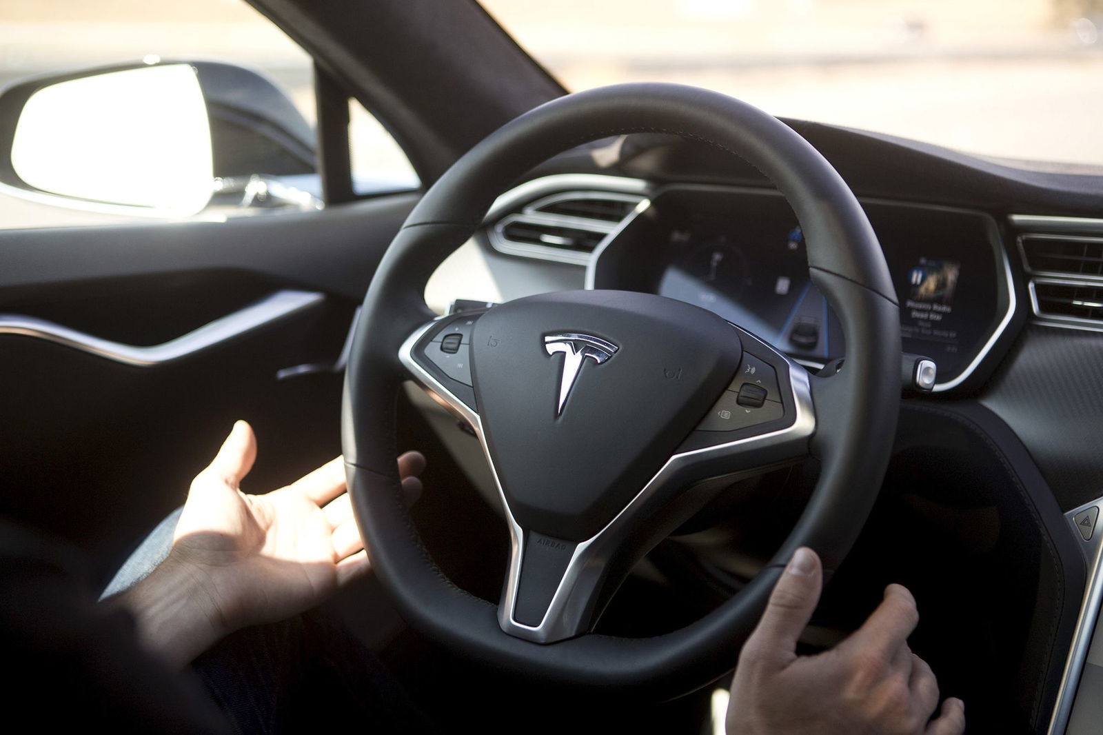 <i>Beck Diefenbach/Reuters via CNN Newsource</i><br/>New Autopilot features are demonstrated in a Tesla Model S during a Tesla event in Palo Alto