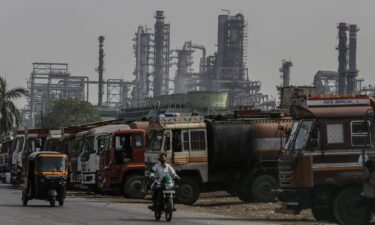 Oil tanker trucks are pictured outside an oil refinery operated by Bharat Petroleum Corp. Ltd.