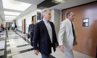 This 2008 photo shows Jeffrey Epstein as he enters a Palm Beach County courtroom in Florida.