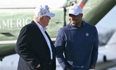 President Donald Trump walks with Philadelphia Eagles running back Saquon Barkley before boarding Air Force One on April 27. Barkley said on August 4 that he was surprised to learn he had been named to the President’s Council on Sports