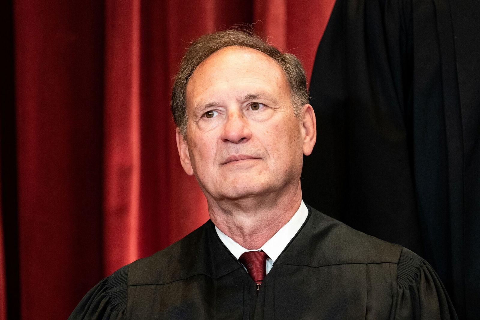 <i>Erin Schaff/Pool/Getty Images/File via CNN Newsource</i><br/>Associate Justice Samuel Alito sits during a group photo of the Justices at the Supreme Court in Washington