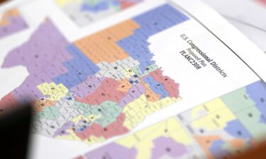 A map of proposed plan for Texas' US Congressional Districts is seen at a public hearing on congressional redistricting in Austin