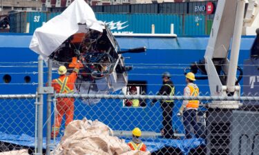 Debris from the Titan submersible is unloaded at the Canadian Coast Guard pier in St. John's