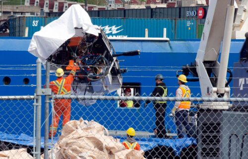 Debris from the Titan submersible is unloaded at the Canadian Coast Guard pier in St. John's