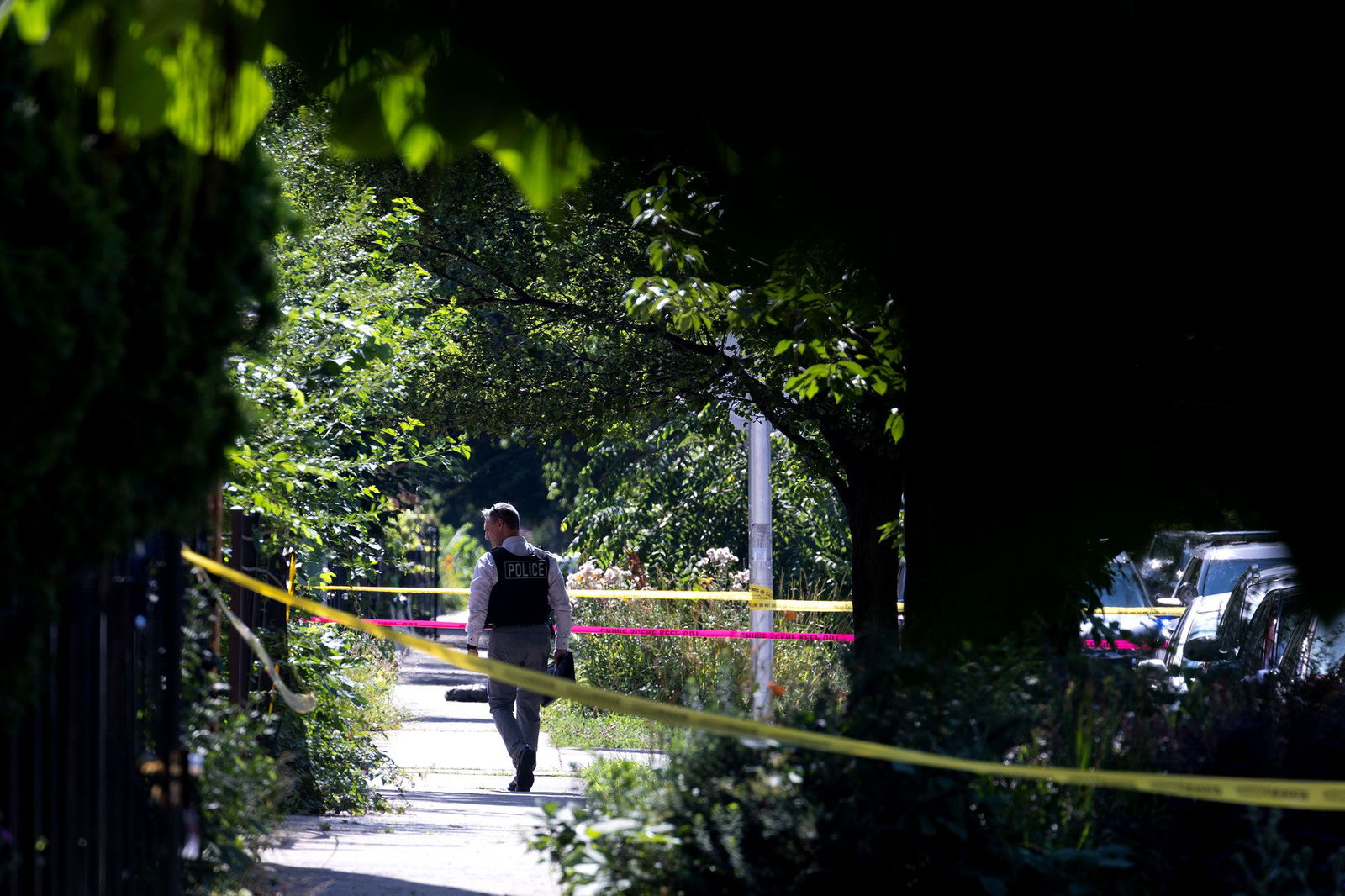 <i>Scott Olson/Getty Images/File via CNN Newsource</i><br/>Police investigate the scene of a drive-by shooting in Chicago on July 6