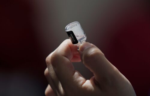Medical staff prepare a syringe with the Pfizer-BioNTech biologic in Mexico City.  The US Health and Human Services is “winding down” its mRNA vaccine development.